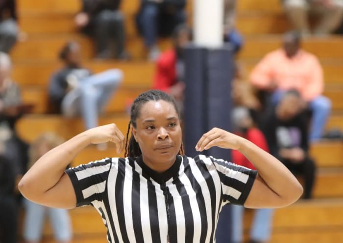 Official Tisha McAfee of Compton enjoys "giving back" to the game.